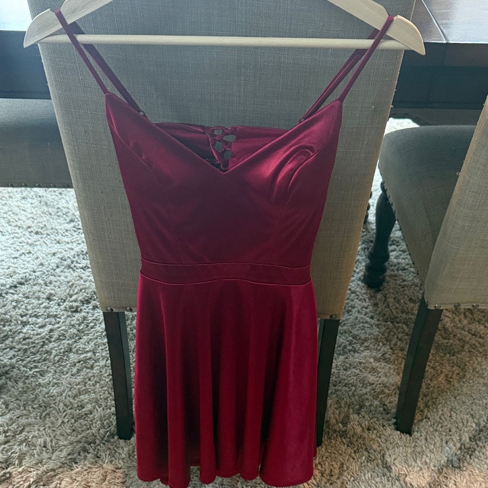 Red satin dress with spaghetti straps and lace up back